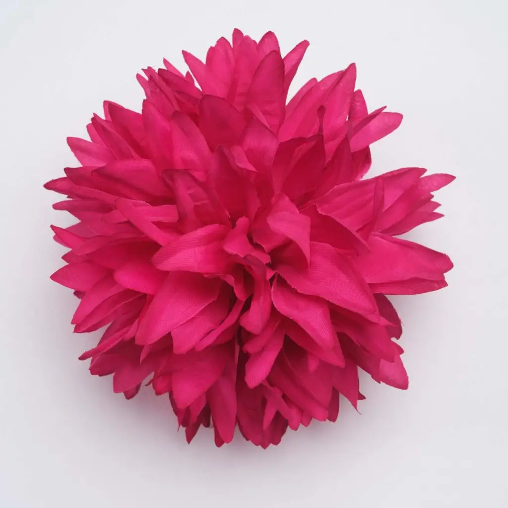 Flor de flamenca fucsia para peinados de moda flamenca