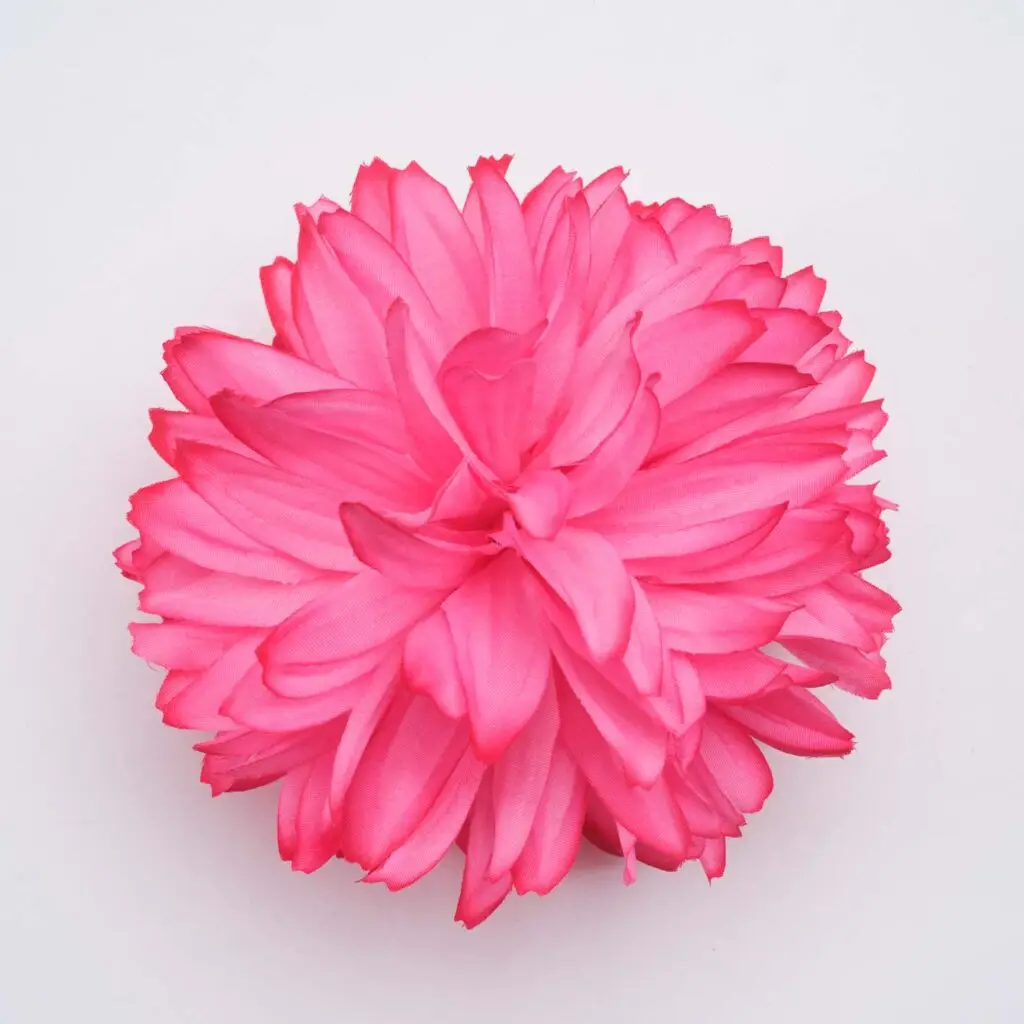 Flor de flamenca rosa fucsia para peinados de moda flamenca