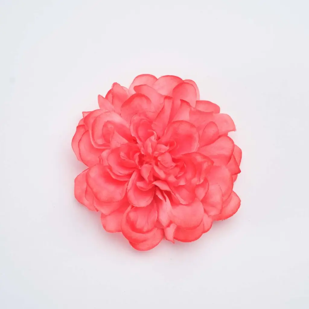Flor de flamenca coral claro para peinados de moda flamenca