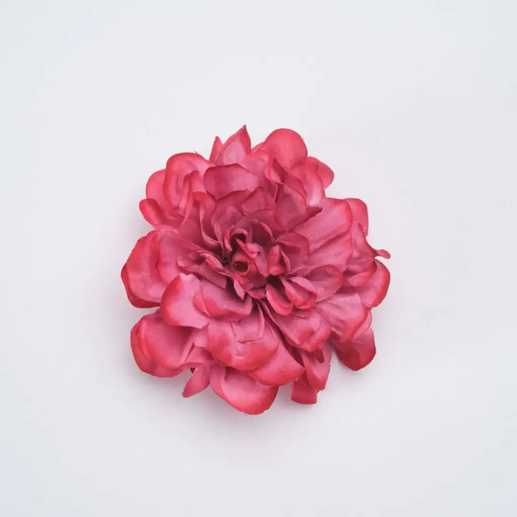 Flor de flamenca rosa coral para peinados de moda flamenca