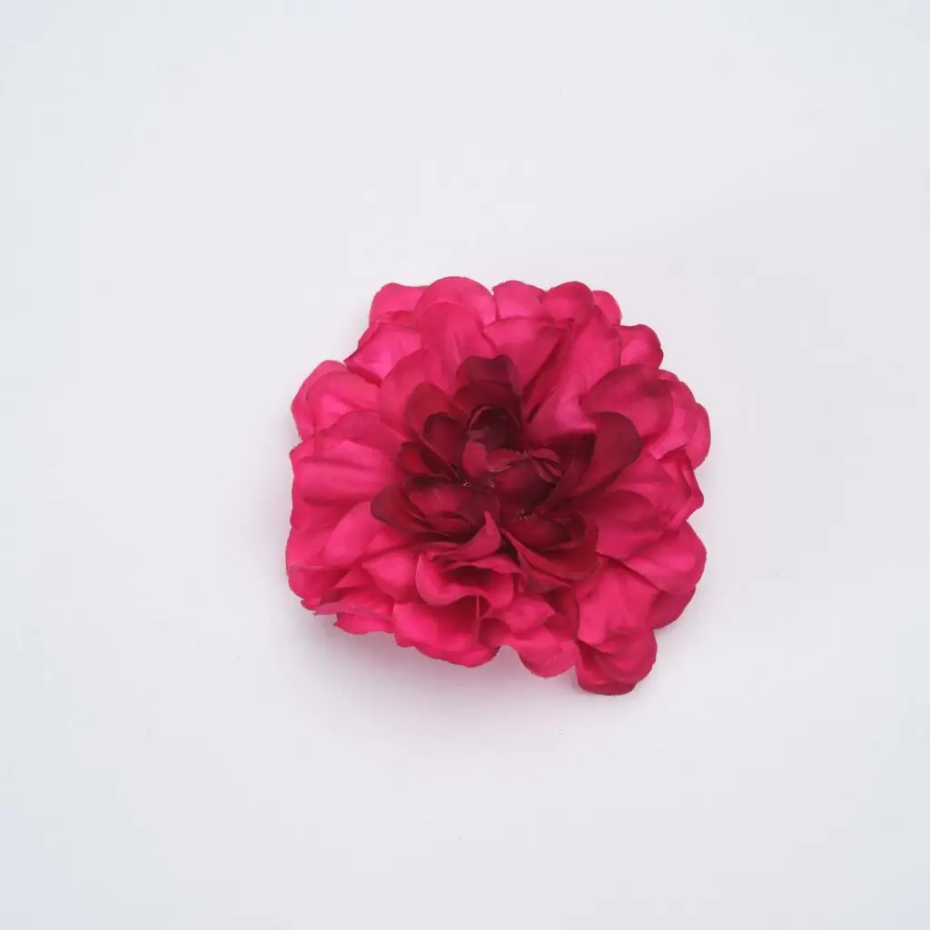 Flor de flamenca fucsia y burdeos para peinados de moda flamenca