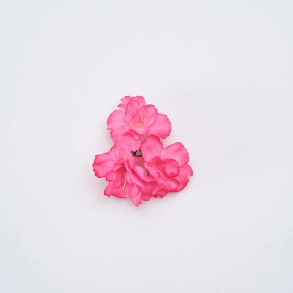 Flores de flamenca rosas para peinados de moda flamenca